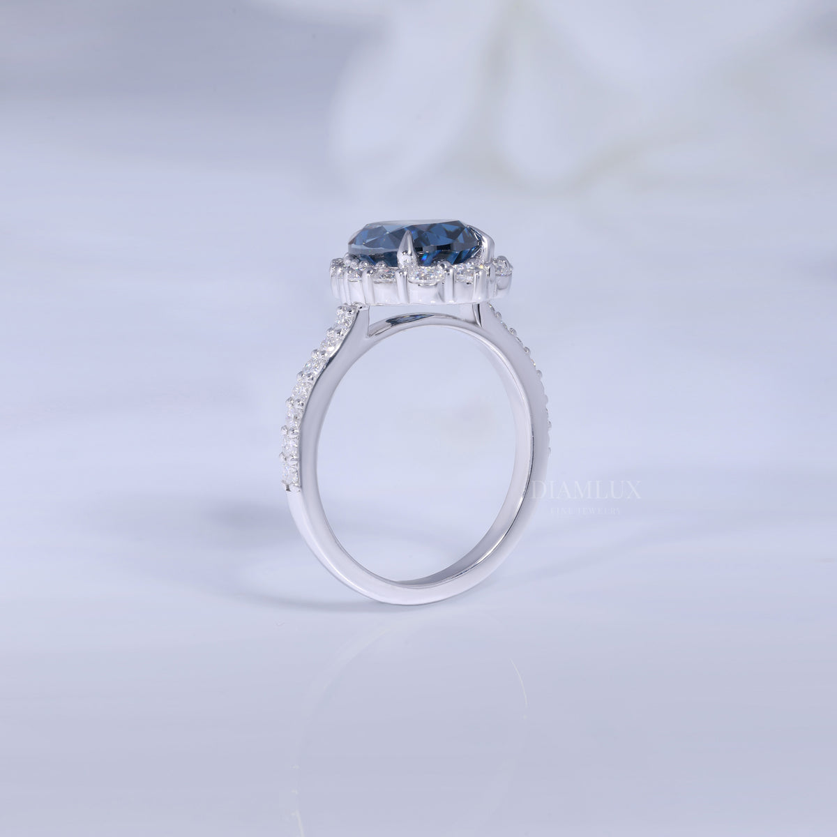Pear Cut London Blue Topaz Halo Ring in 14K White Gold Diamlux Fine Jewelry